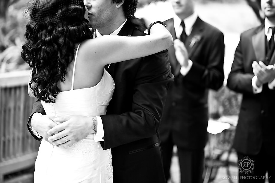 Bride and Groom Kiss Black and white wedding portrait