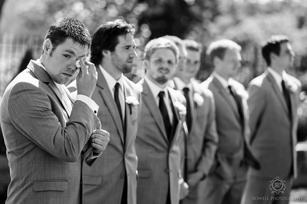 Muskoka photographer captures groom shedding happy tears during Muskoka wedding.