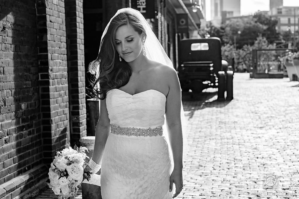 Toronto photographer captures bride at her Toronto wedding at Historic Distillery and Fermenting Cellar.