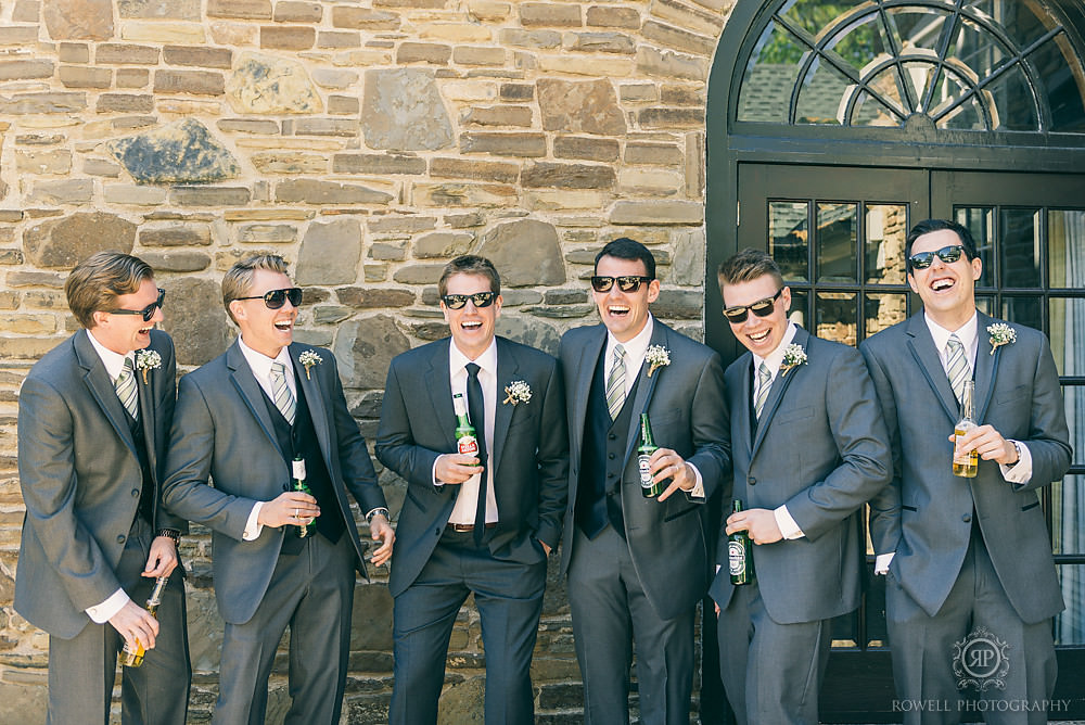 groomsmen get a laugh before wedding ceremony at glen erin inn