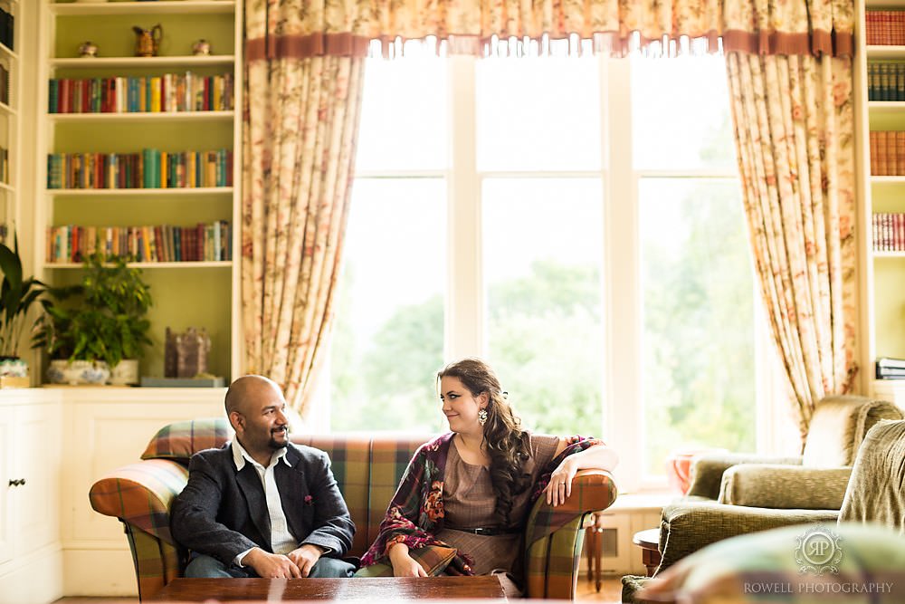 Couples photos in the library at Glengarry castle scotland