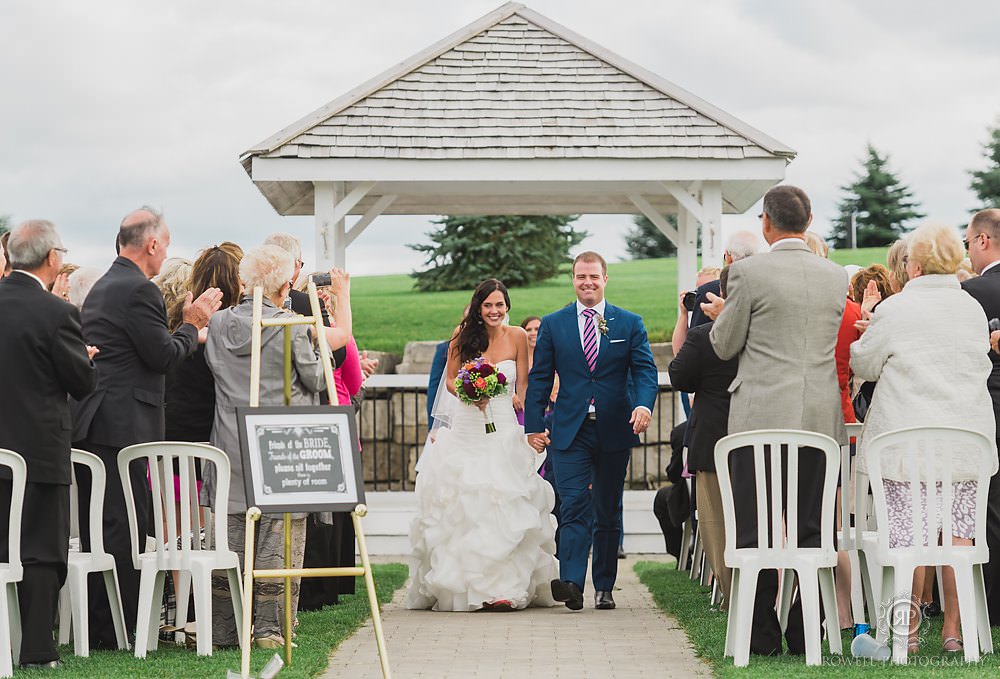 walking down the aisle at tangle creek golf club