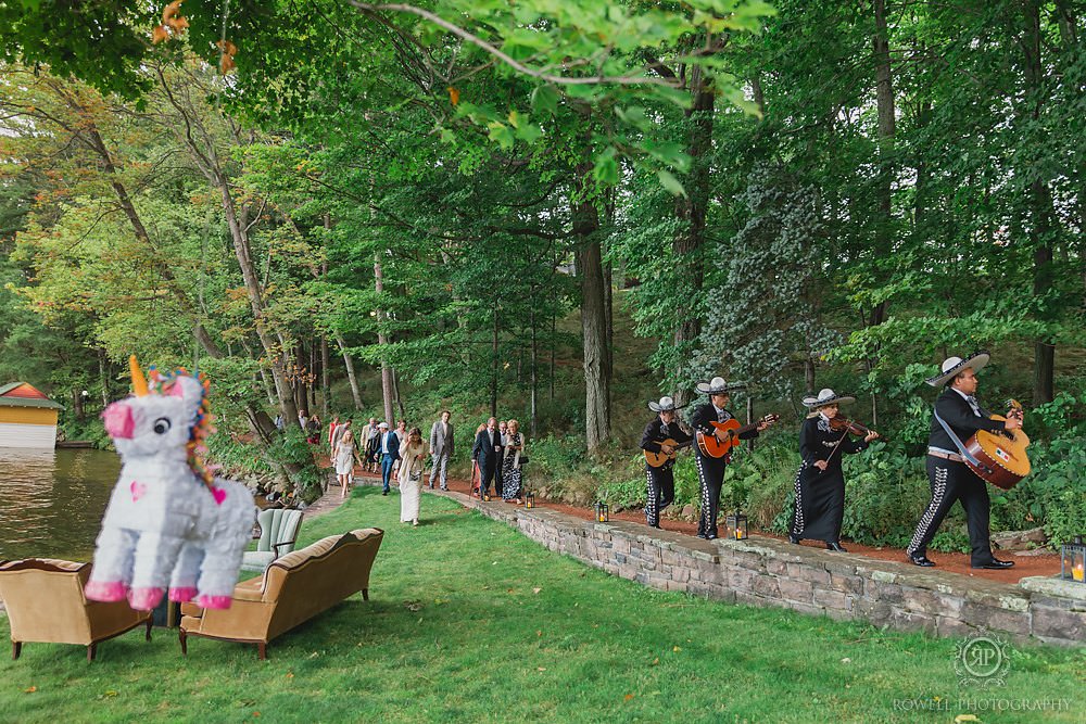 mariachi band escorts guests to wedding