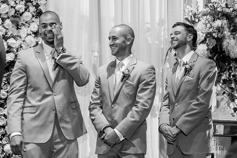 emotional groomsmen at fermenting cellar wedidng