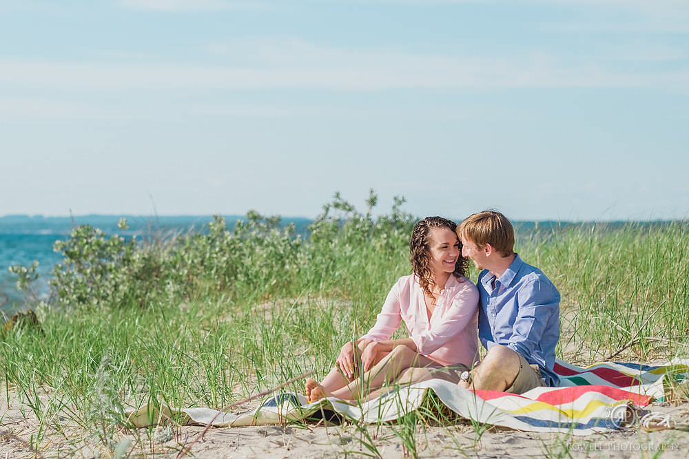 couples on a hudsons bay blanket engagement