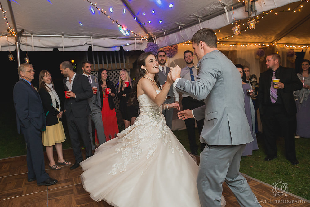 bride and groom on the dancefloor tent wedding