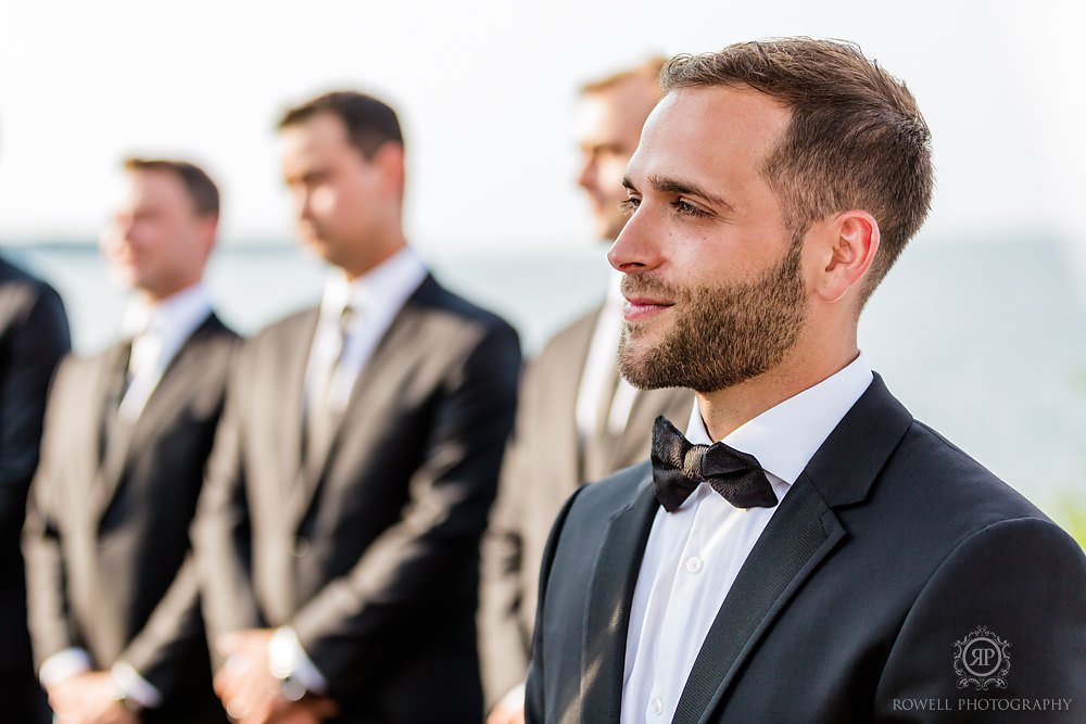 a romantic backyard wedding groom at ceremony